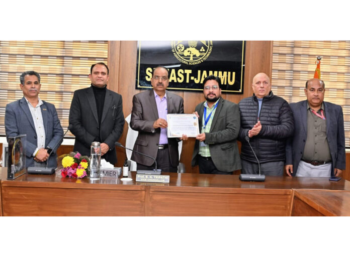 SKUAST-J Vice Chancellor awarding certificate to a participant during valedictory function of training programme.