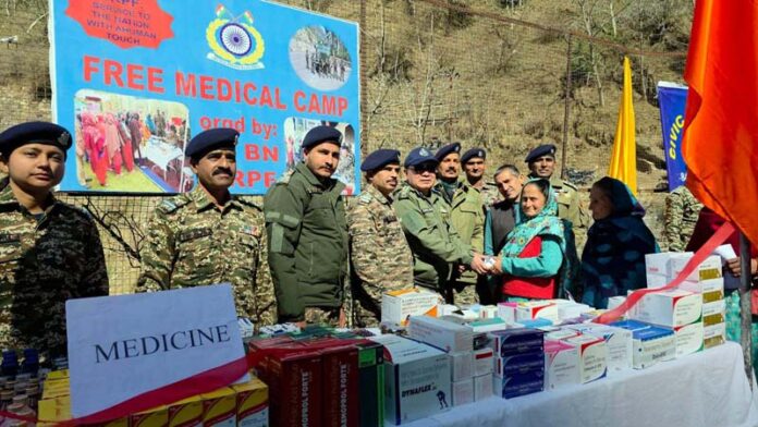 Senior CRPF officers and doctors during a medical camp at village Palli in Ramban district.