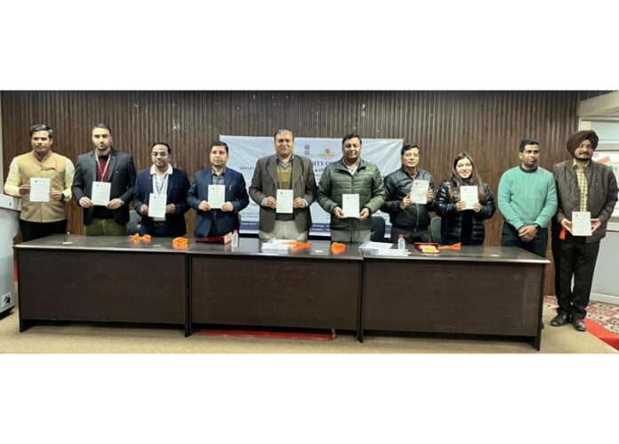 Chief guest and others releasing booklet during inaugural function of workshop.