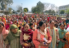 Members of several SHGs during a protest in Reasi on Friday.