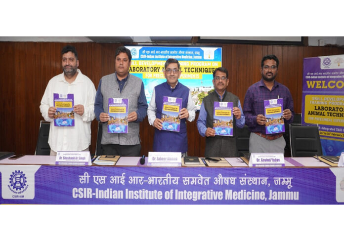 Director of CSIR-IIIM Jammu and others releasing brochure of 3-day SDP on Tuesday.