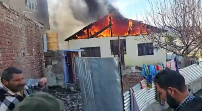 A house on fire in Bhaderwah. -Excelsior/Tilak Raj