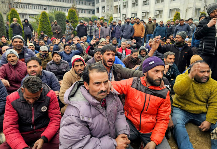 SMC employees during a protest in Srinagar on Monday. —Excelsior/Shakeel