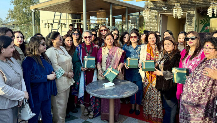 BJP J&K Vice President Rekha Mahajan posing along with others during inaugural event.