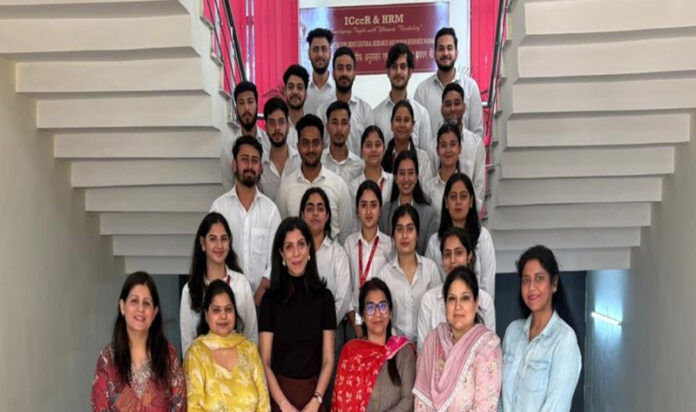 Participants with the resource person during workshop on Global Business Communication at JU.