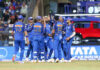 Mumbai Indian players celebrating after taking wicket against KKR in Mumbai on Sunday.