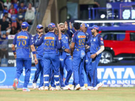 Mumbai Indian players celebrating after taking wicket against KKR in Mumbai on Sunday.