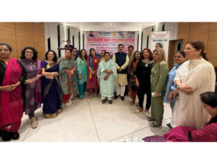 Eminent ladies posing for a group photograph during a function organised in Jammu.