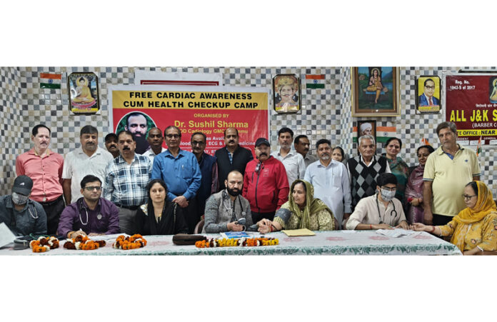 HoD Cardiology GMC & SSH Jammu Dr Sushil Sharma examining patients at Rani Park, Jammu on Sunday.