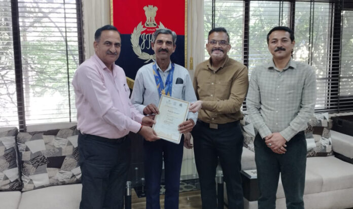 SSP PCR Jammu Dr Koshal Kumar Sharma honouring ASI Rakesh Kumar. SSP PCR Jammu Dr Koshal Kumar Sharma honouring ASI Rakesh Kumar.