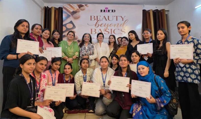 Participants posing for a group photograph along with certificates during workshop.