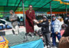 Councillor Karsha, Stanzin Jigmath, presenting trophy to a participant at Zanskar Winter Sports and Tourism Festival.