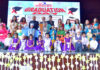 Achievers of Jodhamal Juniors posing with guests and teachers during a function.