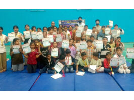 Winners posing along with dignitaries during prize distribution ceremony.