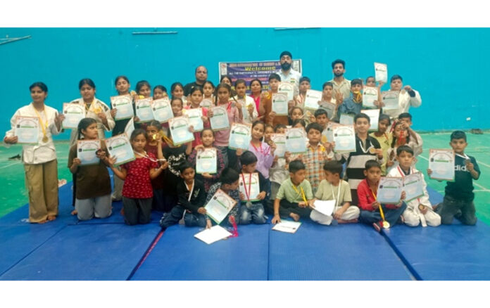 Winners posing along with dignitaries during prize distribution ceremony.