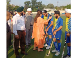 Secretary J&K Sports Council, Nuhzat Gul interacting with hockey players at KK Hakku Hockey Stadium, Jammu.