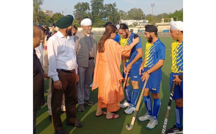 Secretary J&K Sports Council, Nuhzat Gul interacting with hockey players at KK Hakku Hockey Stadium, Jammu.