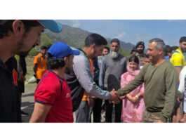 Dignitary interacting with players during inaugural event.