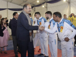 Dignitary interacting with players during inaugural event on Tuesday.