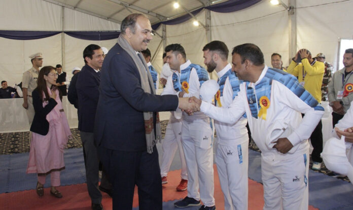 Dignitary interacting with players during inaugural event on Tuesday.