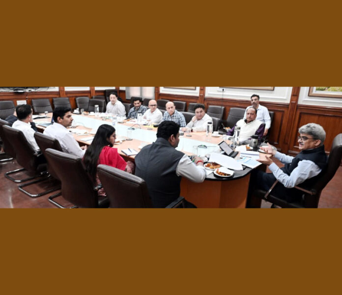 Chief Secretary chairing a meeting at Jammu on Sunday.