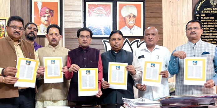 Sat Sharma, president J&K BJP and MP (RS) releasing teachings of Guru Ravi Dass compiled by Balbir Ram Rattan at Jammu on Saturday. Sat Sharma, president J&K BJP and MP (RS) releasing teachings of Guru Ravi Dass compiled by Balbir Ram Rattan at Jammu on Saturday.