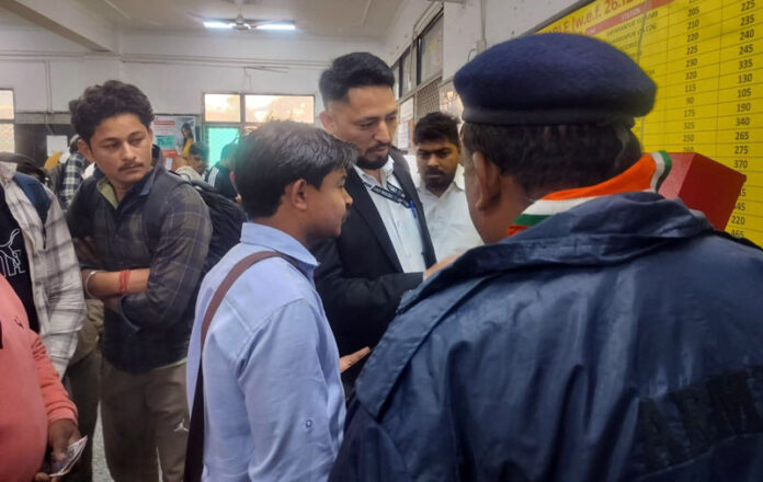 Railway officials and volunteers conducting special drive at railway station.