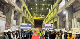 NHPC officials posing on the commissioning of third unit of Subansiri Lower Hydroelectric Project.