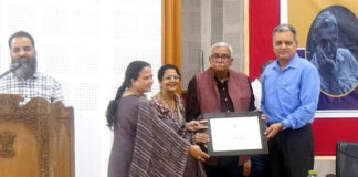 Dignitaries presenting a memento to Dr Lalit Gupta during a function in Jammu.