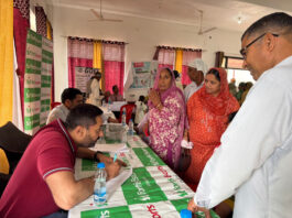 Doctors checking the patients during a medical camp organized in Ramgarh.