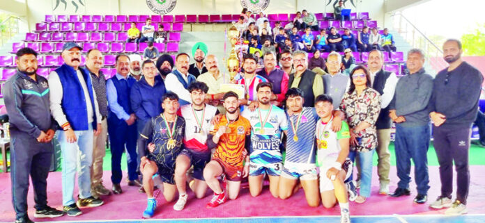 MLA Jammu East Yudhvir Sethi and others presenting trophy to winning team.