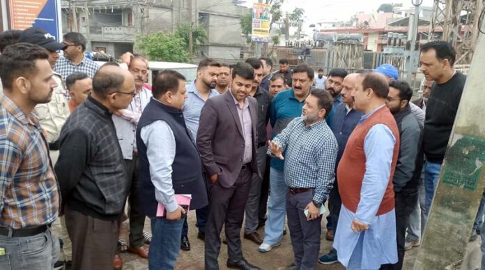 JMC Commissioner, Dr. Devansh Yadav along with others listening to public issues during a visit to different Wards in Jammu on Wednesday.