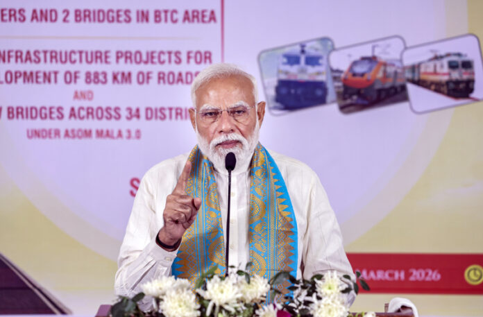 Prime Minister Narendra Modi addresses the foundation stone laying and unveiling ceremony in Kokrajhar, Assam.