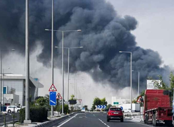 Smoke billows out of liquefied natural gas hubs at Ras Laffan Industrial City in Qatar following attack by Iran.