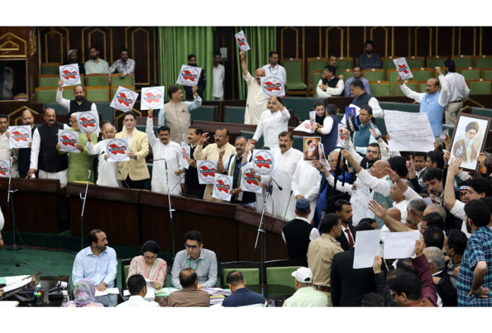 MLAs of different political parties protesting in the Assembly on Friday. — Excelsior/Rakesh