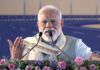 Prime Minister Narendra Modi addresses a public meeting in Silchar, Assam on Saturday. (UNI)