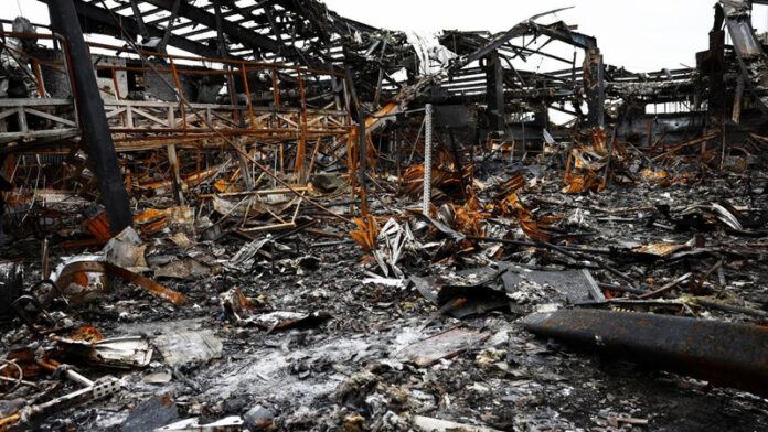 A view of a car repair shop and dealership damaged by a strike, amid the U.S.-Israeli conflict with Iran, in Tehran on Saturday.