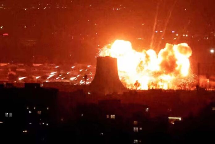 Fiery aftermath of an airstrike on an oil depot in northeast Tehran.