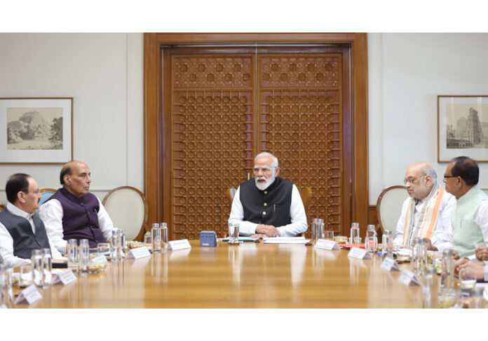 Prime Minister Narendra Modi chairs a high-level meeting in New Delhi on Sunday. (UNI)