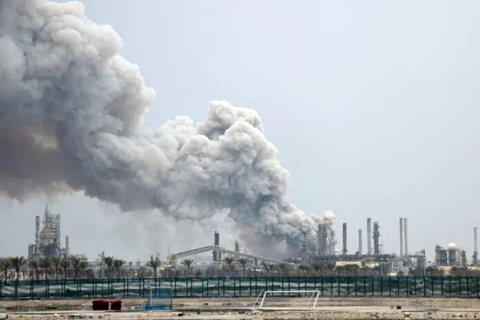 Smoke rises following a strike on the Bapco Oil Refinery, amid the US-Israeli attacks on Iran, on Sitra Island Bahrain, on Monday.