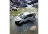 Remains of a car which fell into a rivulet in Bhaderwah on Friday. — Excelsior/Tilak Raj