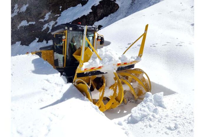 A BRO vehicle clearing snow at Chattergala Pass on Bhaderwah-Bani-Basohli National Highway.