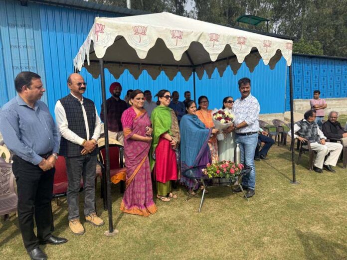 Dr. Vinod Bakshi presenting bouquet to chief guest Ankur Mahajan during inaugural event on Wednesday.
