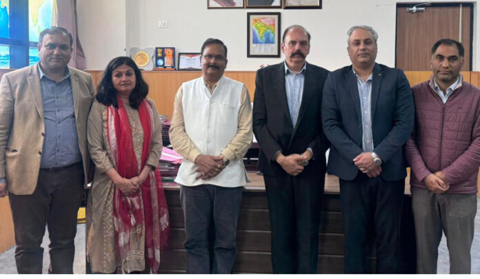 Prof Yashwant Singh (Registrar CUJ), Khurshid Maqbool Dar (Director, CII J&K Council) and others posing together after signing an MoU.