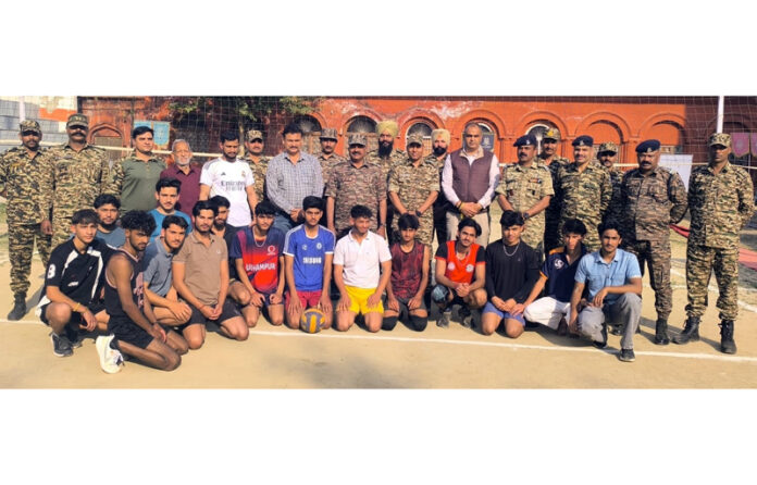 Players posing along with officers during an event.