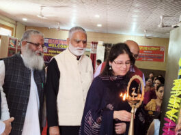 Dignitaries lighting a lamp during a programme in Jammu on Monday.