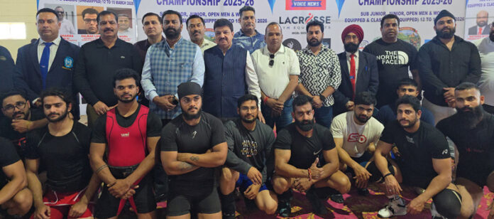 Powerlifters posing along with dignitaries during inaugural ceremony of North India Powerlifting Championship in Jammu on Thursday. Powerlifters posing along with dignitaries during inaugural ceremony of North India Powerlifting Championship in Jammu on Thursday.