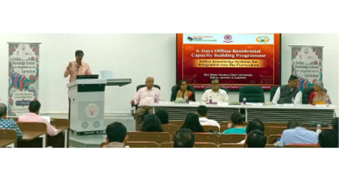 Guests on dais during valedictory session of capacity building program at SMVDU.