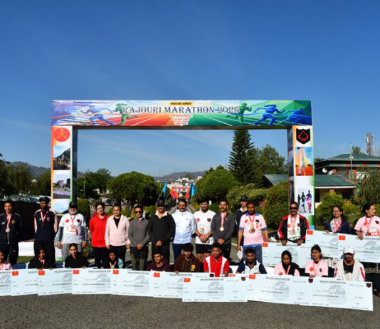 Dignitaries presenting medals and cheques to winners during prize distribution ceremony in Rajouri on Sunday. -Excelsior/Amit Sharma