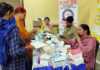 Staff members of Rich Harvest School attending ESI Medical Camp on Monday.